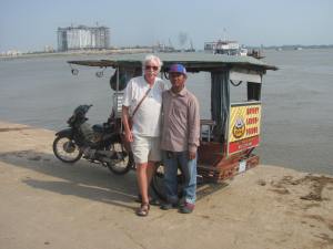 Graham with one of our friendly tuk- tuk drivers.