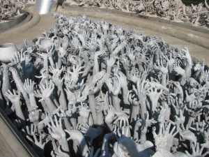 The "Sea of Hands" holding skulls to symbolize our journey from hell to heaven.