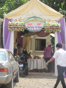 Preparing the tent for a Cambodian wedding.