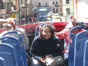 A local family celebrating Carnival week on our bus tour. Squirting foam and throwing water is their idea of fun!