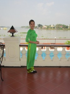 My waitress dressed in her Ao Doi.