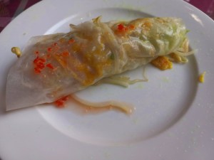 Banh Xeo-a crispy pancake filled with fresh veggies&herbs, rolled in rice paper.